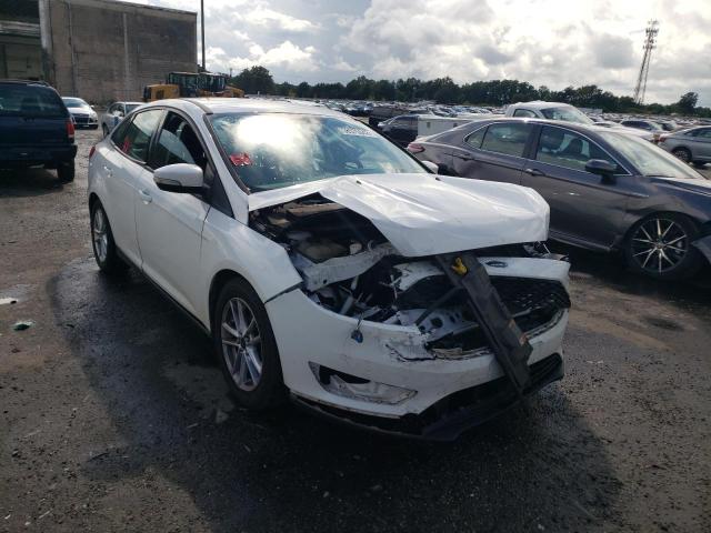 Photo 9 from auction – 2015 FORD FOCUS SE with VIN 1FADP3F28FL304942