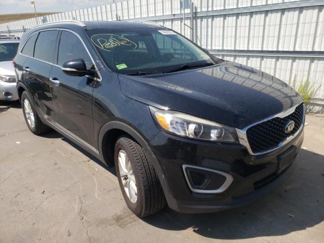 KIA SORENTO LX 2016 with VIN 5XYPGDA34GG047563 - Photo from auction