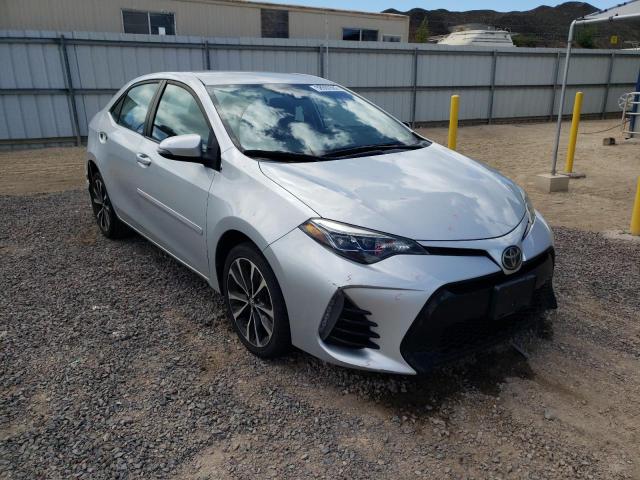 TOYOTA COROLLA L 2017 with VIN 5YFBURHE9HP578729 - Photo from auction