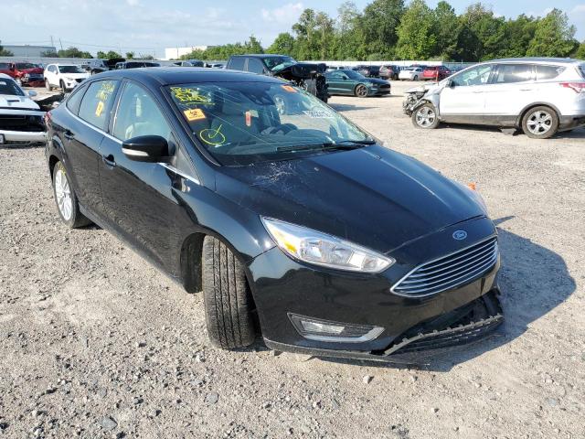FORD FOCUS TITA 2017 with VIN 1FADP3J29HL330847 - Photo from auction