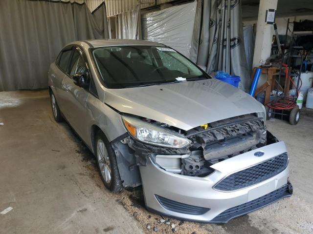 FORD FOCUS SE 2016 with VIN 1FADP3F21GL401787 - Photo from auction