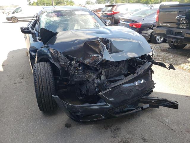 Photo 9 from auction – 2009 MAZDA RX8 with VIN JM1FE17P590400976