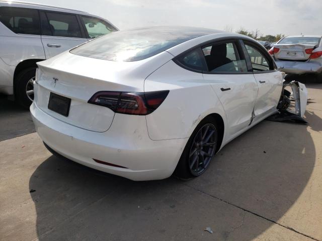 Photo 4 from auction – 2021 TESLA MODEL 3 with VIN 5YJ3E1EA0MF087184
