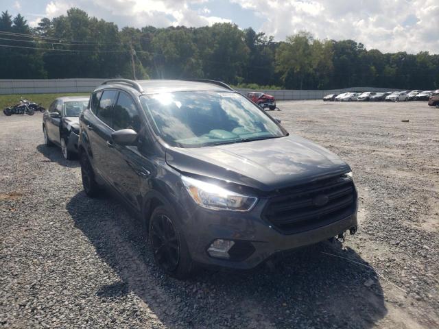 FORD ESCAPE SE 2018 with VIN 1FMCU0GD3JUB04093 - Photo from auction