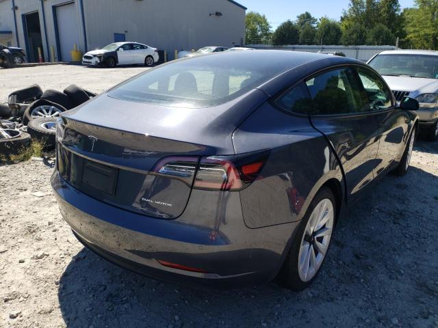 Photo 4 from auction – 2022 TESLA MODEL 3 with VIN 5YJ3E1EB3NF164334