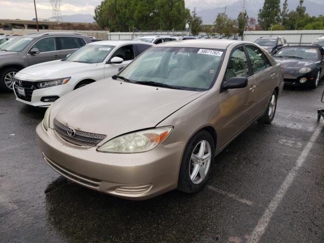 Photo 2 from auction – 2002 TOYOTA CAMRY LE with VIN JTDBE30K120045528
