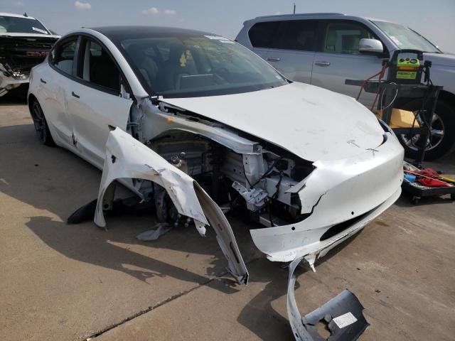 TESLA MODEL 3 2021 with VIN 5YJ3E1EA0MF087184 - Photo from auction