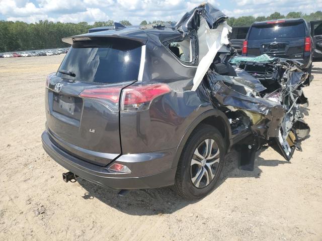 Photo 4 from auction – 2017 TOYOTA RAV4 LE with VIN JTMZFREV6HJ712727