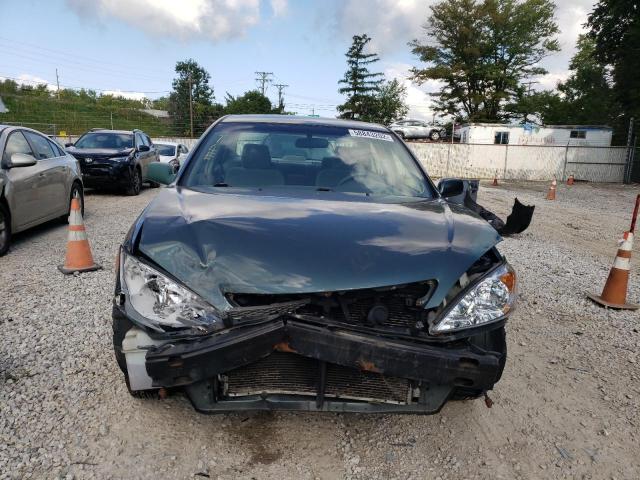 Photo 9 from auction – 2004 TOYOTA CAMRY LE with VIN 4T1BE32K34U360075