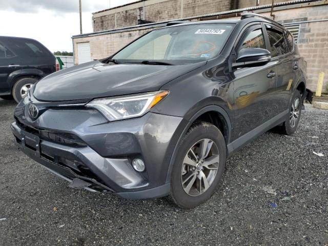 Photo 2 from auction – 2017 TOYOTA RAV4 XLE with VIN JTMWFREV2HJ123581