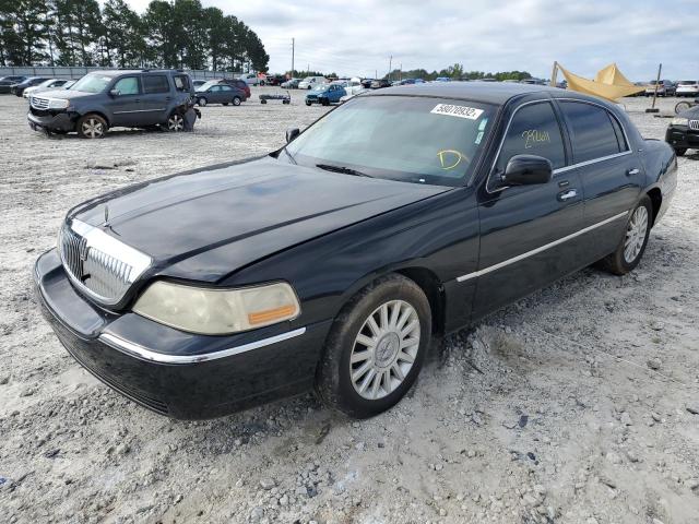 Photo 2 from auction – 2004 LINCOLN TOWN CAR U with VIN 1LNHM83W54Y673665
