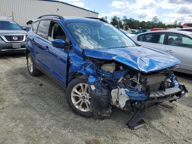 FORD ESCAPE SE 2018 with VIN 1FMCU0GD1JUD26079 - Photo from auction