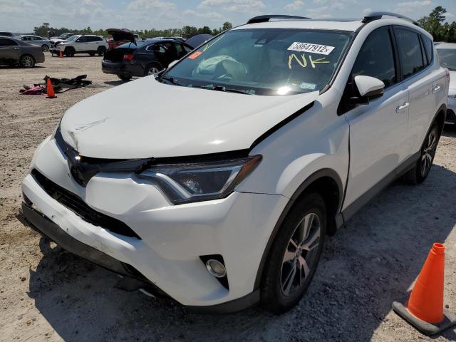 Photo 2 from auction – 2017 TOYOTA RAV4 XLE with VIN 2T3WFREV6HW362391
