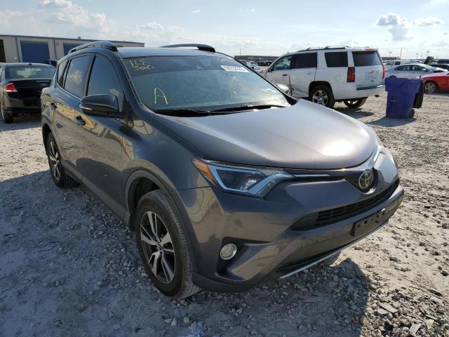 TOYOTA RAV4 XLE 2017 with VIN JTMWFREV5HJ709532 - Photo from auction