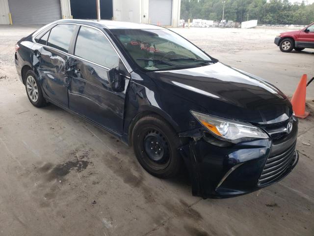 TOYOTA CAMRY LE 2017 with VIN 4T1BF1FK1HU329618 - Photo from auction