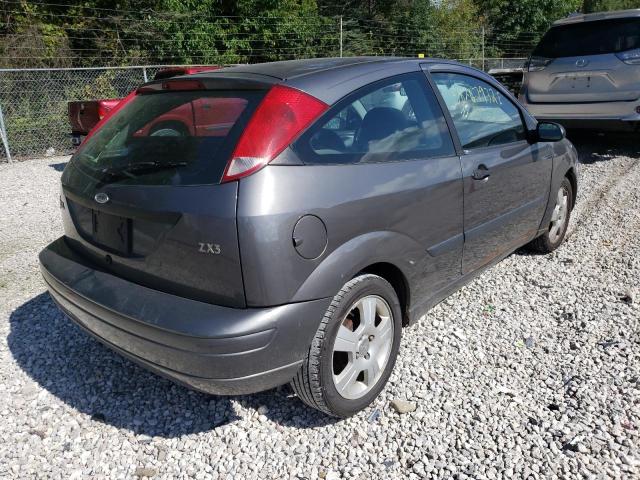 Photo 4 from auction – 2003 FORD FOCUS with VIN 3FAFP31373R114605
