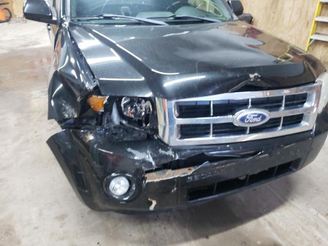 Photo 9 from auction – 2011 FORD ESCAPE LIM with VIN 1FMCU9EG5BKB45694
