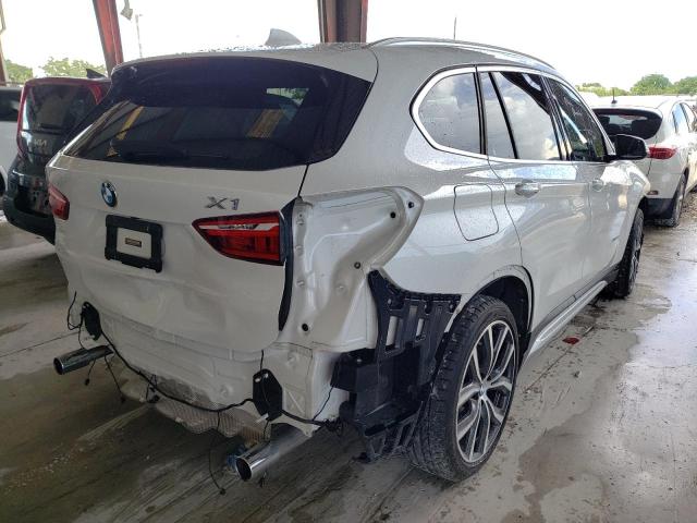 Photo 4 from auction – 2017 BMW X1 XDRIVE2 with VIN WBXHT3C33H5F75005