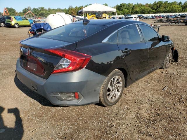 Photo 4 from auction – 2018 HONDA CIVIC EX with VIN 19XFC2F70JE001062