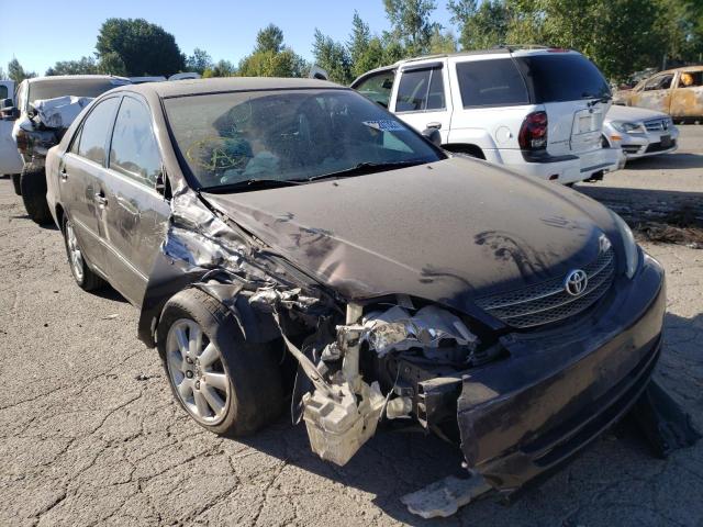 TOYOTA CAMRY LE 2003 with VIN 4T1BF30K33U554779 - Photo from auction