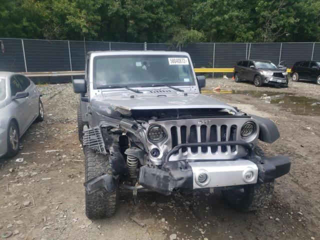 Photo 9 from auction – 2014 JEEP WRANGLER U with VIN 1C4BJWDG4EL120292