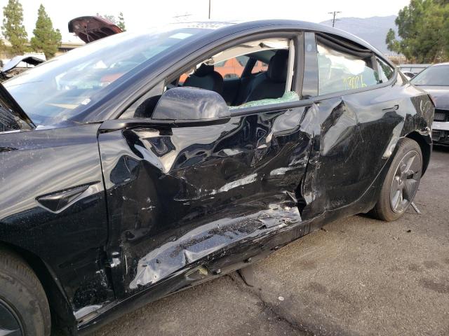 Photo 9 from auction – 2022 TESLA MODEL 3 with VIN 5YJ3E1EB8NF190380
