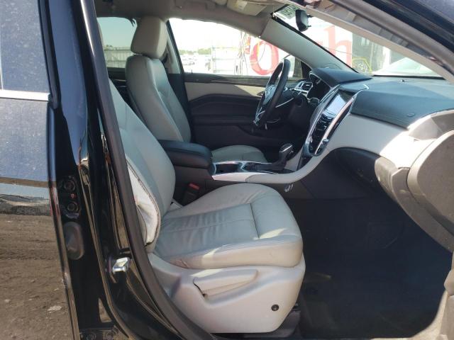 Foto 5 de la subasta – 2014 CADILLAC SRX con VIN 3GYFNAE37ES663256