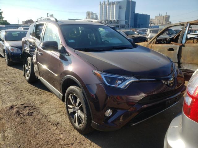 TOYOTA RAV4 ADVEN 2018 with VIN 2T3RFREV1JW784393 - Photo from auction
