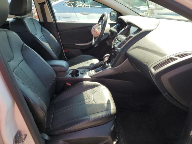 Photo 5 from auction – 2014 FORD FOCUS TITA with VIN 1FADP3J22EL450761