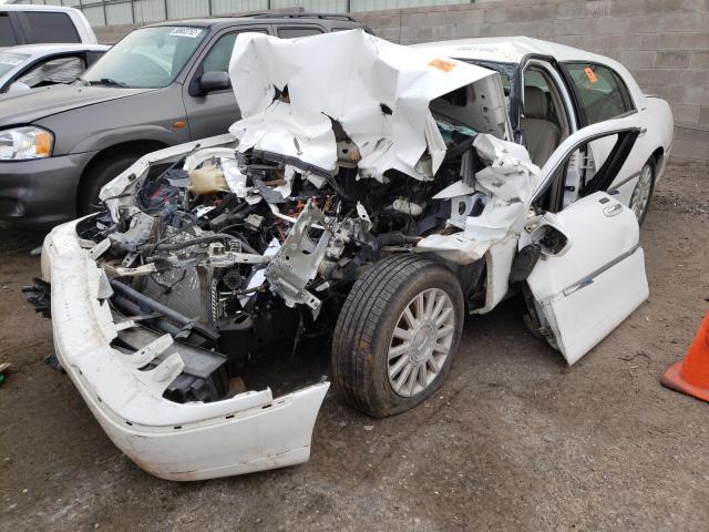 Photo 2 from auction – 2004 LINCOLN TOWN CAR E with VIN 1LNHM81W94Y647752