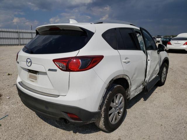 Photo 4 from auction – 2014 MAZDA CX-5 TOURI with VIN JM3KE2CYXE0402324