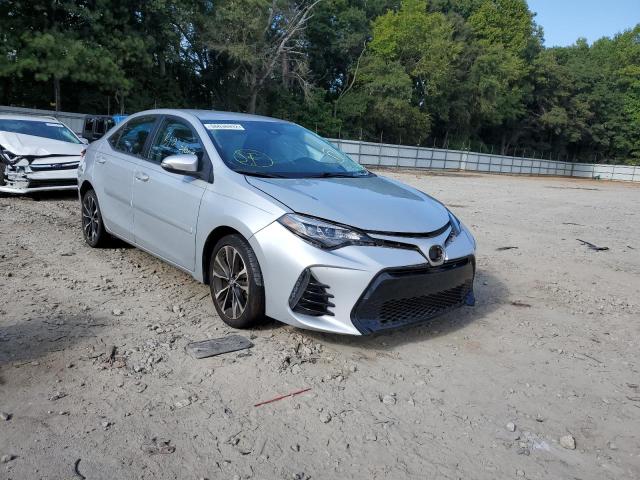 TOYOTA COROLLA L 2017 with VIN 2T1BURHE2HC864535 - Photo from auction