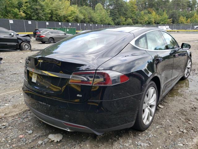 Photo 4 from auction – 2014 TESLA MODEL S with VIN 5YJSA1H16EFP34076