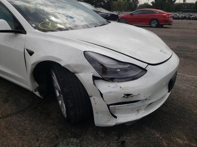 Photo 9 from auction – 2022 TESLA MODEL 3 with VIN 5YJ3E1EB5NF290923
