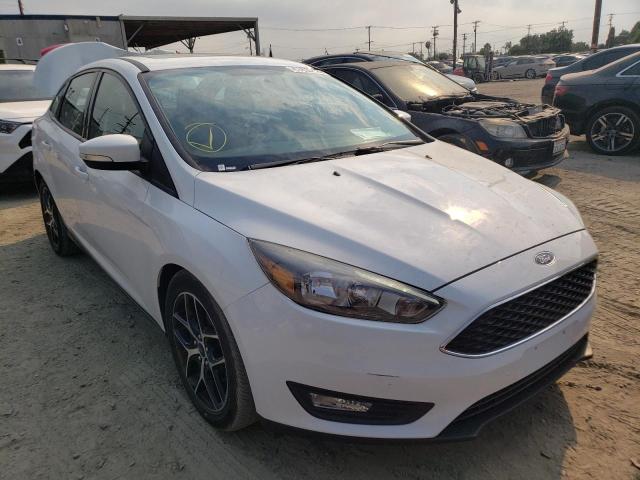 FORD FOCUS SEL 2018 with VIN 1FADP3H21JL313746 - Photo from auction