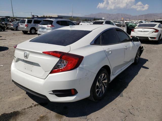 Photo 4 from auction – 2018 HONDA CIVIC EX with VIN 19XFC2F78JE024931