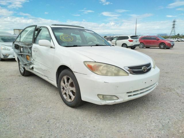 TOYOTA CAMRY LE 2004 with VIN JTDBE32K140283802 - Photo from auction