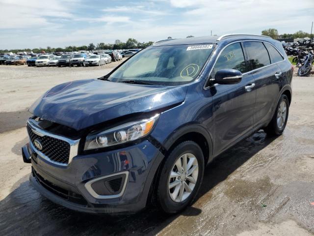 Photo 2 from auction – 2016 KIA SORENTO LX with VIN 5XYPG4A39GG012811