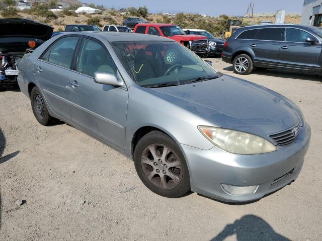 TOYOTA CAMRY LE 2005 with VIN 4T1BF30KX5U591041 - Photo from auction