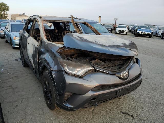 Photo 1 from auction – 2018 TOYOTA RAV4 LE with VIN 2T3ZFREV6JW458573