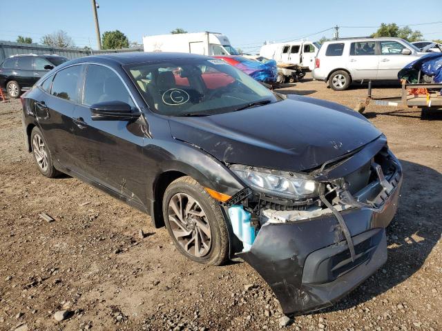 HONDA CIVIC EX 2018 with VIN 19XFC2F70JE001062 - Photo from auction