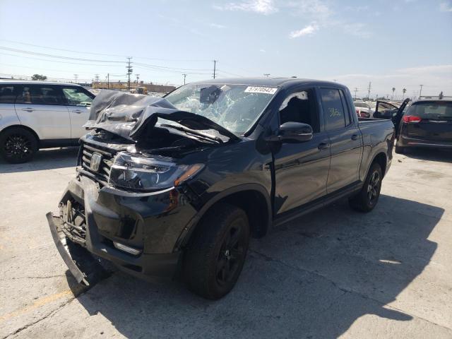 Photo 2 from auction – 2021 HONDA RIDGELINE with VIN 5FPYK3F80MB018573