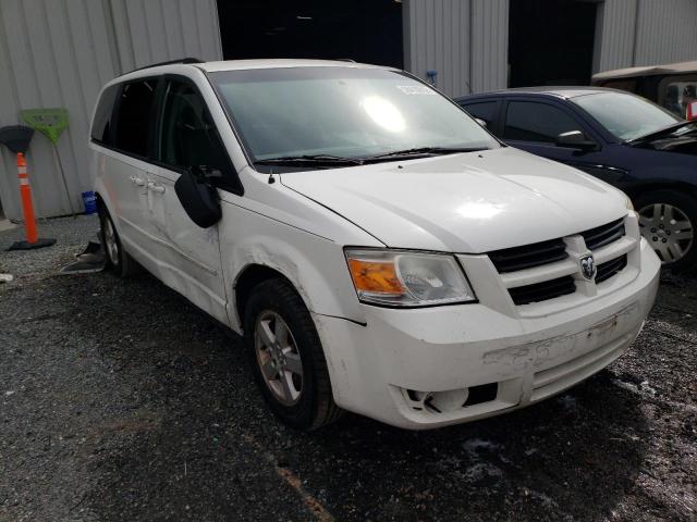 DODGE GRAND CARA 2010 with VIN 2D4RN3D19AR382312 - Photo from auction