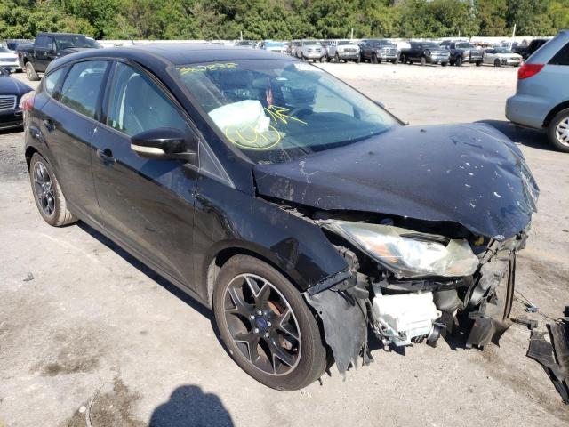 FORD FOCUS SE 2014 with VIN 1FADP3K21EL382838 - Photo from auction