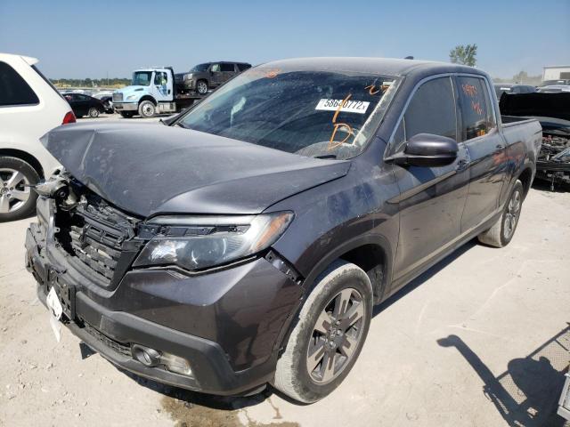Photo 2 from auction – 2018 HONDA RIDGELINE with VIN 5FPYK3F66JB012576