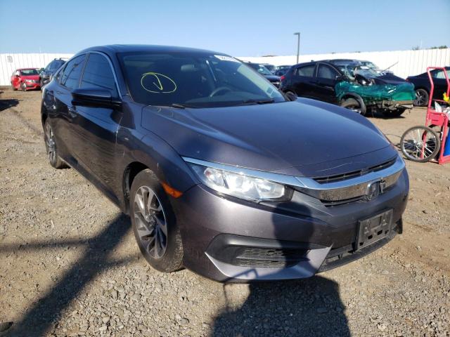 HONDA CIVIC EX 2018 with VIN 2HGFC2F75JH563853 - Photo from auction
