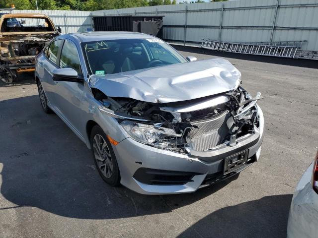 HONDA CIVIC EX 2018 with VIN 2HGFC2F76JH549864 - Photo from auction