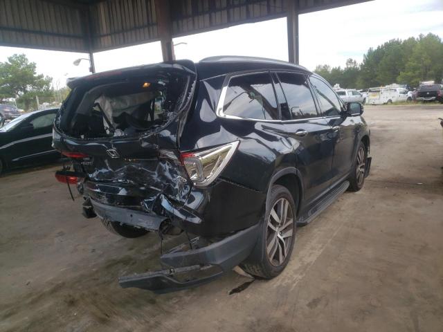 Photo 4 from auction – 2016 HONDA PILOT ELIT with VIN 5FNYF6H03GB023860