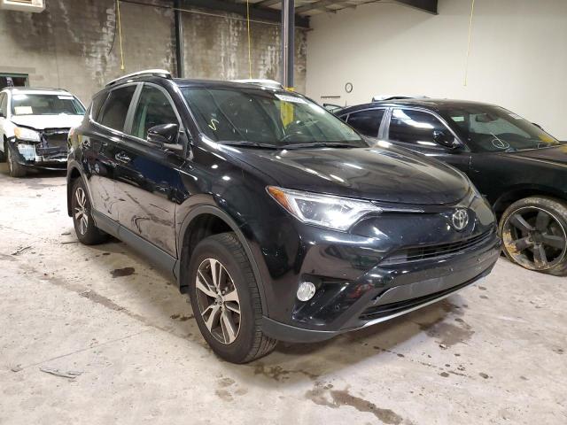 TOYOTA RAV4 XLE 2017 with VIN 2T3RFREV7HW633763 - Photo from auction