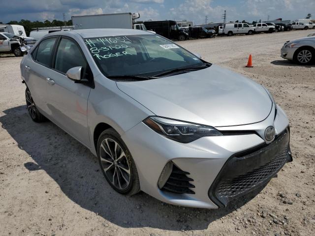 TOYOTA COROLLA 2017 with VIN 5YFBURHE3HP599138 - Photo from auction